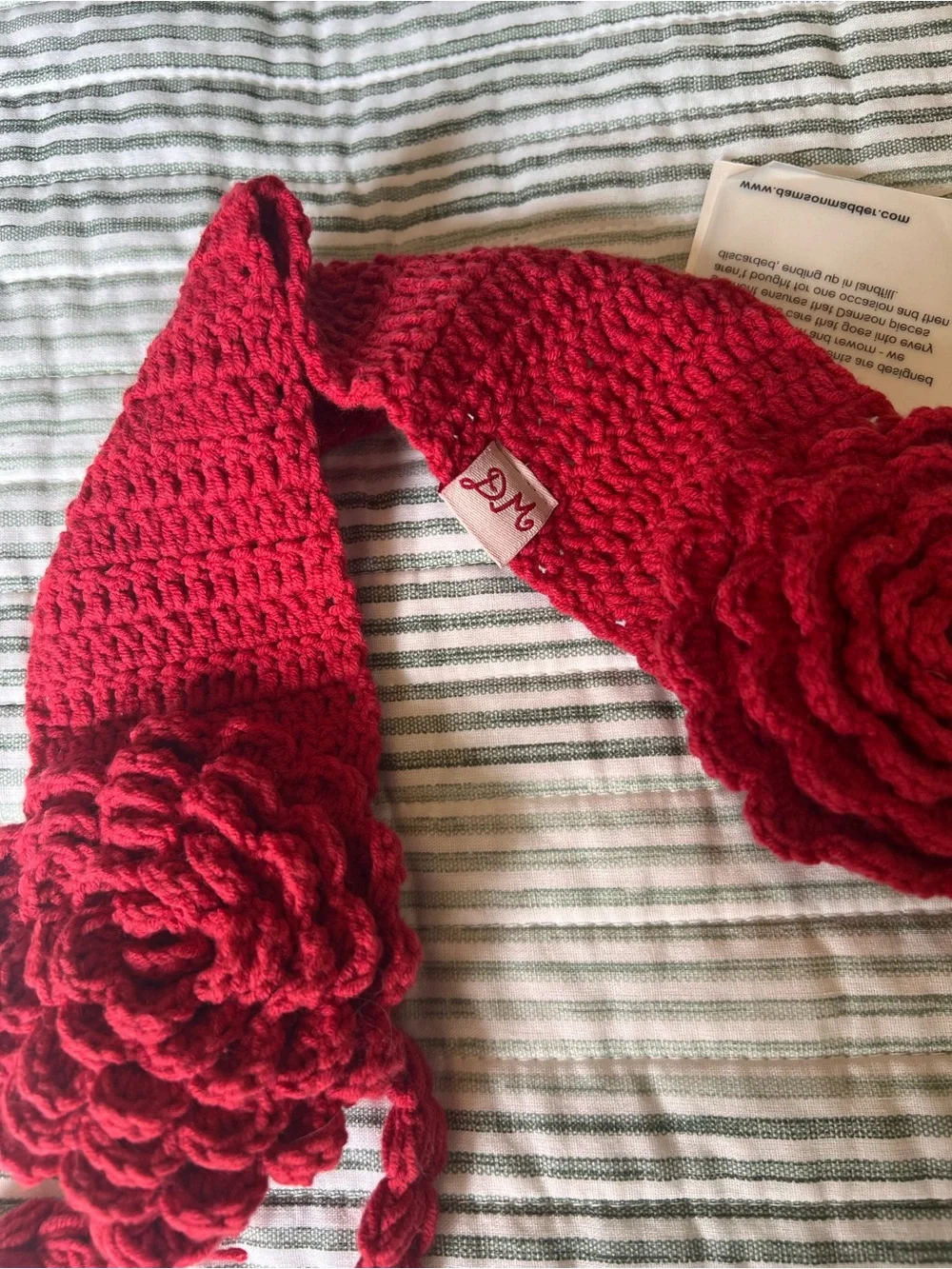 Damson Madder Red Knit Ear Muffs with Flower Accent